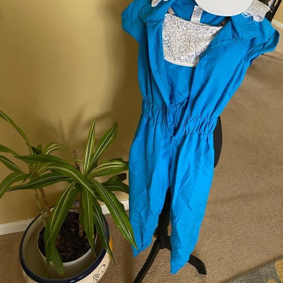 Blue jumpsuit paired with white sequined bra - Picture 2 of 2